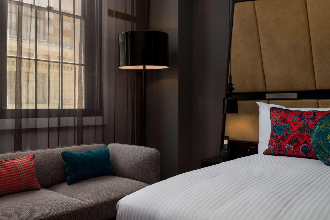 Qt Sydney Hotel Exterior photo A room at the hotel